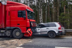 Red truck vs car in collision