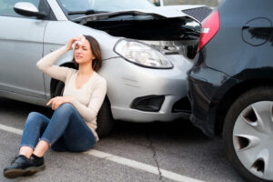 Injured female driver from rear end collision accident.