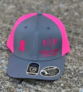 Edwards & Patterson hat for breast cancer awareness.